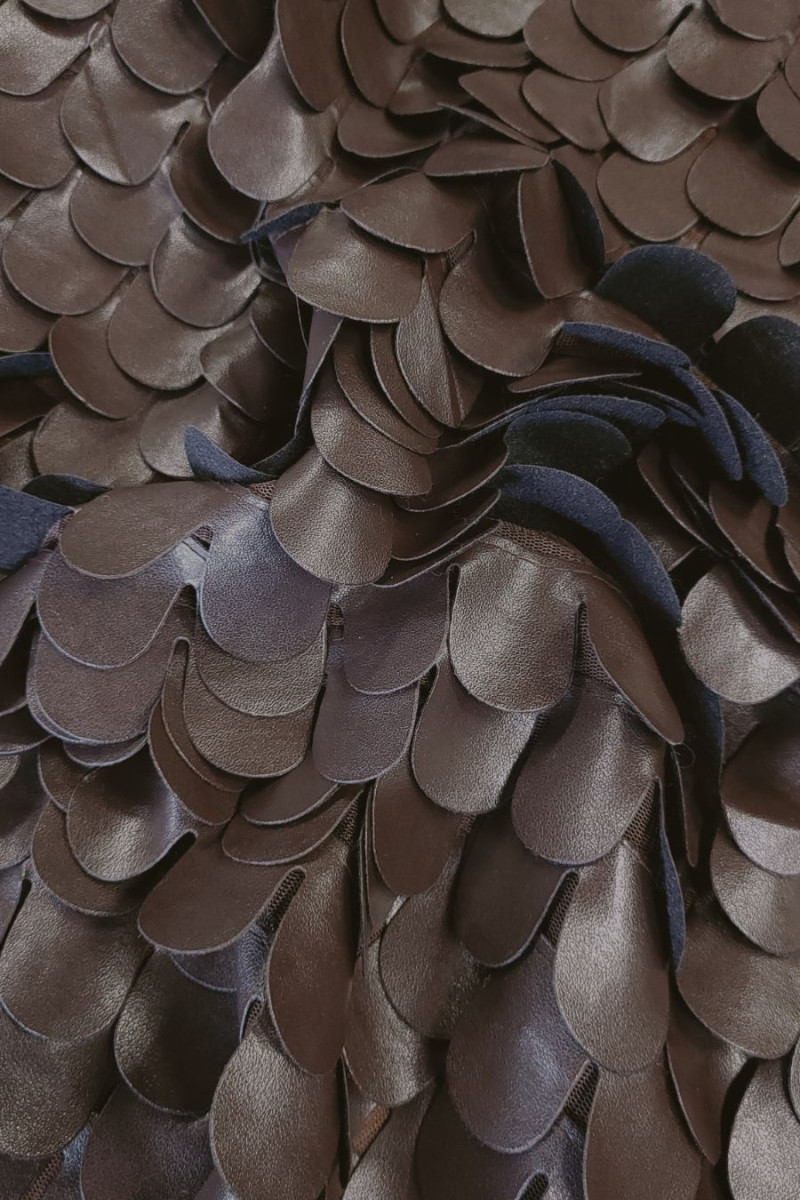 Guscio marrone in pelle ecologica