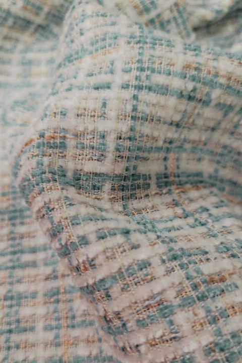 White and turquoise Chanel-style fabric
