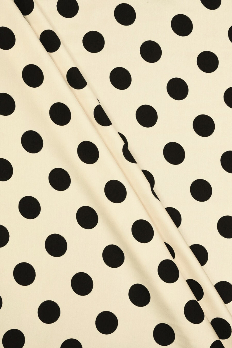 Beige viskos med svarta prickar
