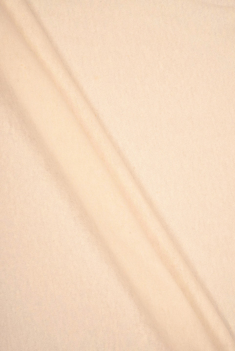 Lininė mezgimo medžiaga šviesiai abrikosų spalvos