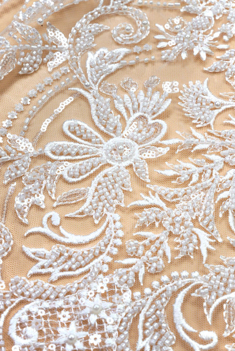 Tulle crème exclusif motif végétal