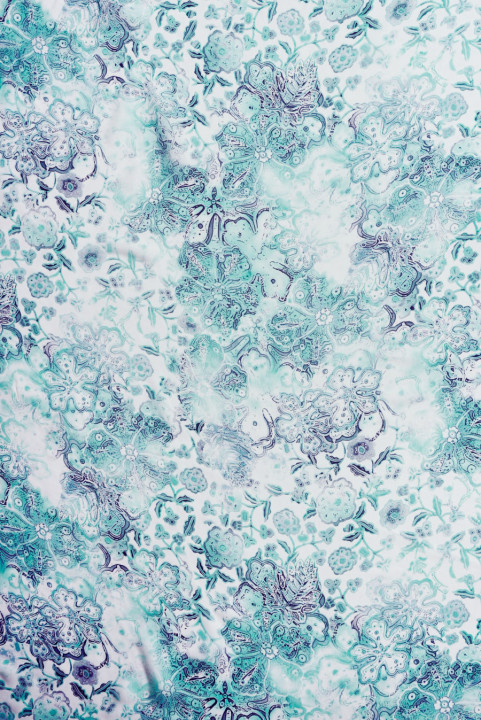 Mousseline viscose-soie à fleurs turquoise