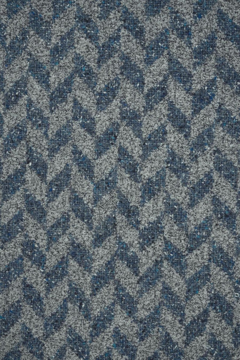 Bouclé-Wolle mit Fischgrätmuster