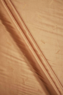 Voodeliiniga logoga karamellibež
