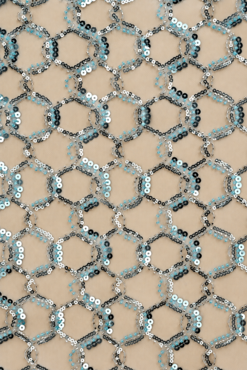 Tulle exclusif turquoise à motif géométrique