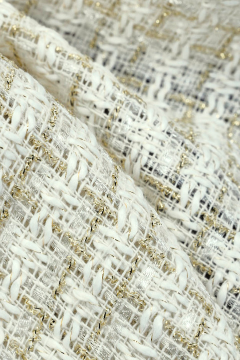 Tejido estilo Chanel en tonos crema y dorado