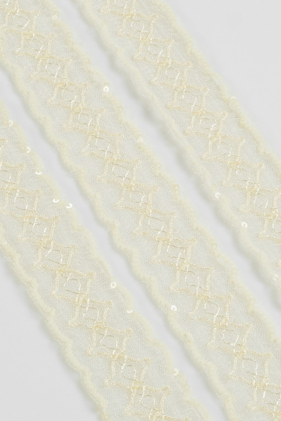 Lace tape with ecru sequins
