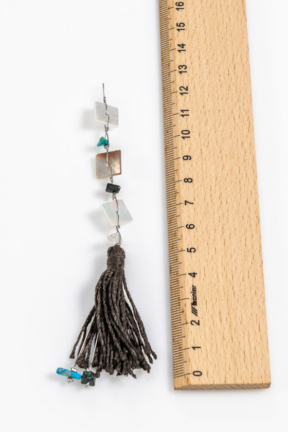 Pendant with tassel and stones